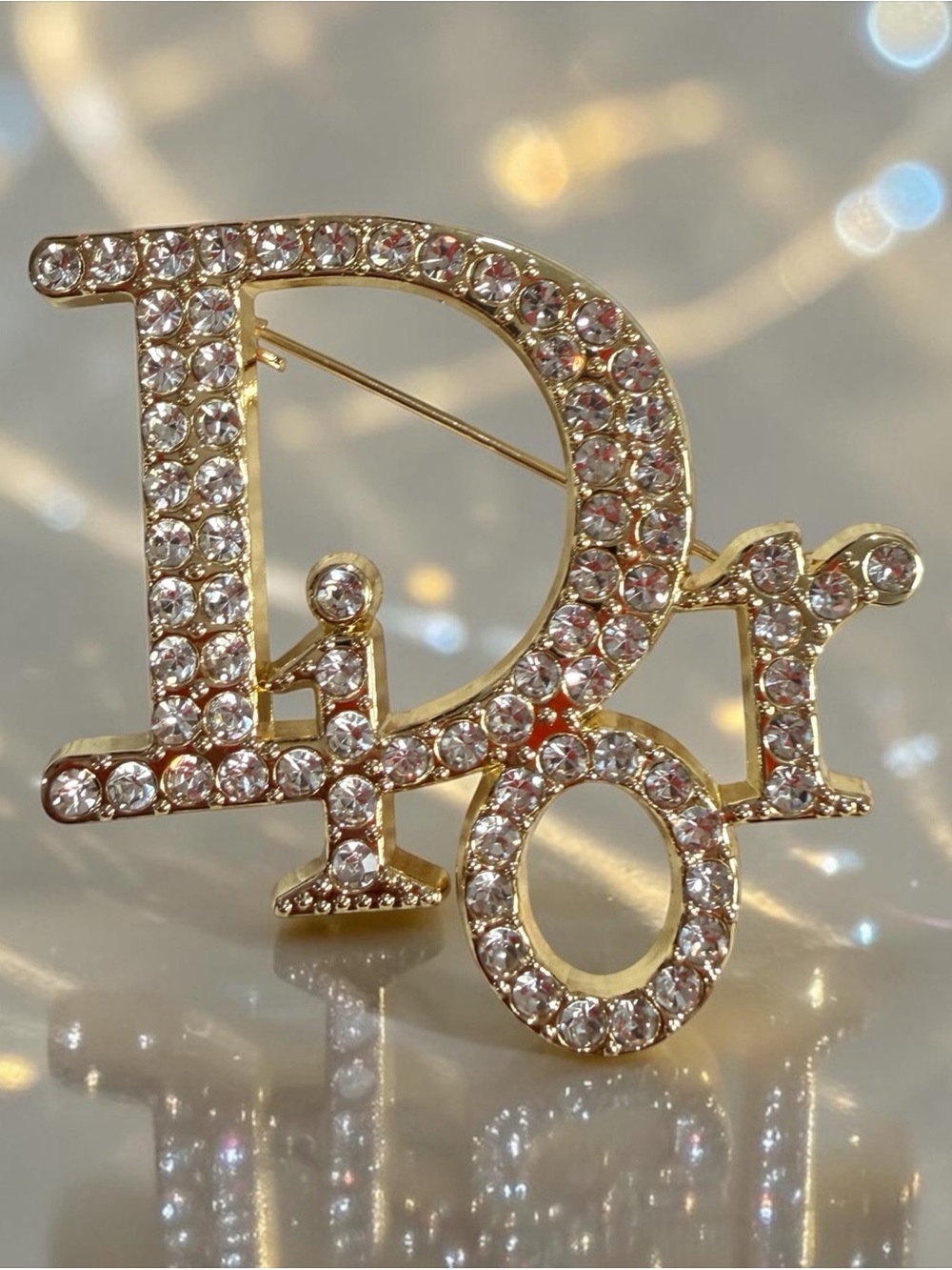 Gold-Tone Logo Brooch with Clear Crystals | New